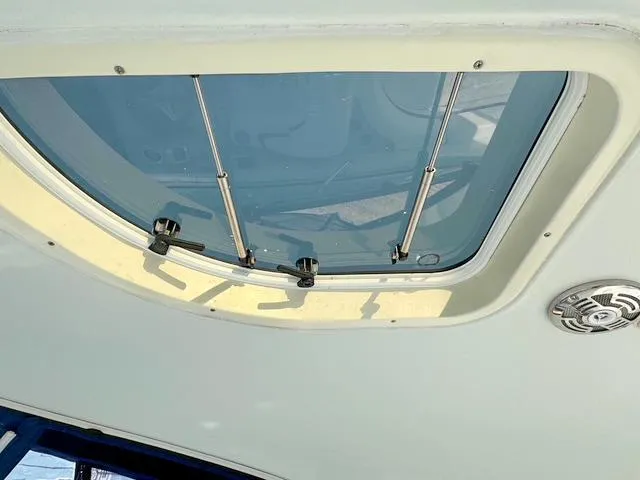 Slide: The Image of Boat hatch on a 2009 Formula 400ss, featuring a sleek design and sturdy hinges. - 14