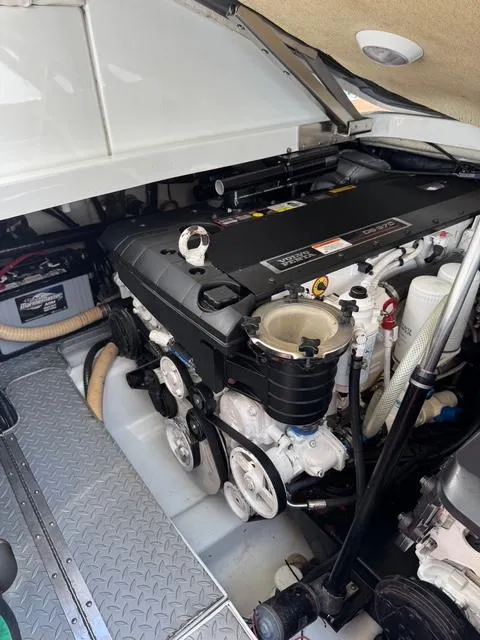 Slide: The Image of Engine compartment of a 2009 Formula 400ss boat, showcasing detailed mechanical components. - 15