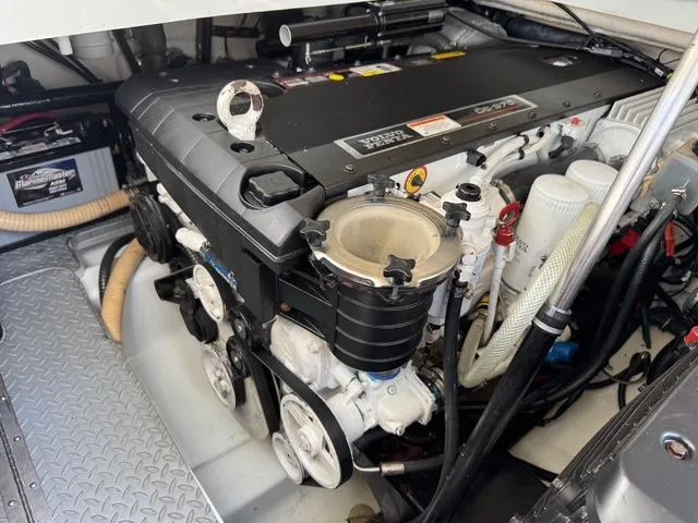 Slide: The Image of Engine compartment of a 2009 Formula 400ss boat, featuring a Volvo Penta engine. - 16