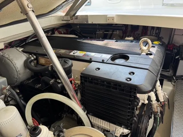 Slide: The Image of Engine compartment of a 2009 Formula 400ss boat, showcasing detailed mechanical components. - 18