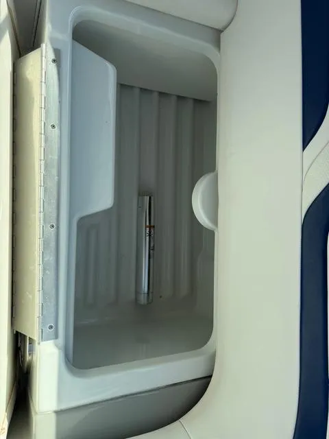 Slide: The Image of Boat storage compartment in a 2009 Formula 400ss, featuring a sleek interior design. - 24