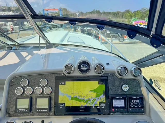 Slide: The Image of Dashboard of 2009 Formula 400ss boat with navigation and control instruments. - 30
