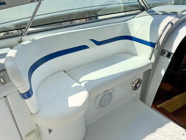 Slide: The Image of 2009 Formula 400ss boat interior with white and blue seating. - 41