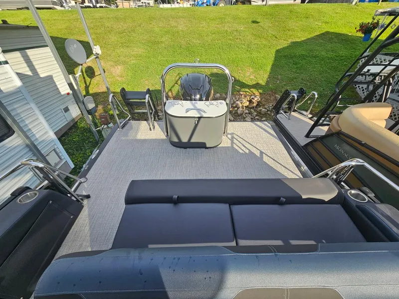 Slide: The Image of 2025 Tahoe Pontoon Cascade Cruise Rear Bench with spacious seating and modern design. - 12