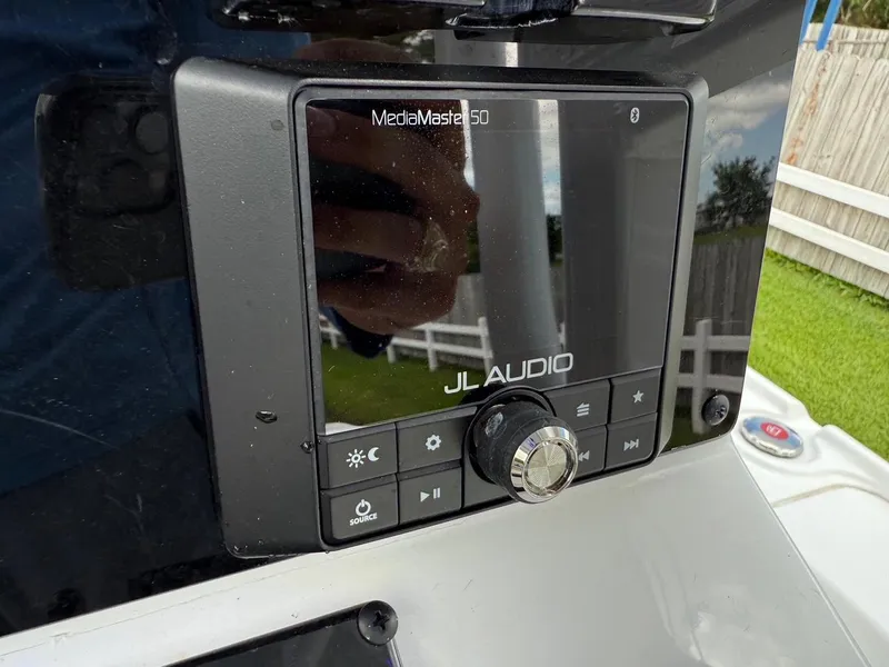 Slide: The Image of JL Audio MediaMaster 50 on 2023 Sea Hunt BX22 boat dashboard. - 18