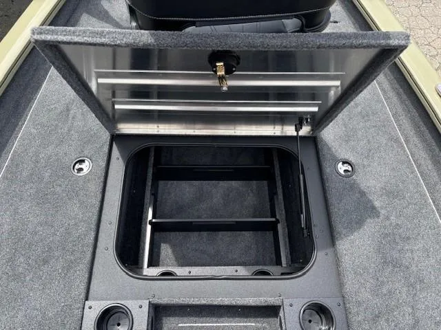 Slide: The Image of Open storage compartment on 2025 Tracker Pro Team 175 boat deck. - 11