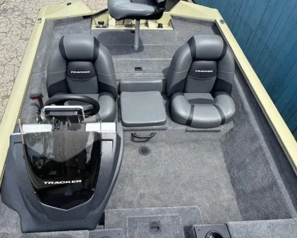 Slide: The Image of 2025 Tracker Pro Team 175 boat interior with dual seats and steering console. - 13