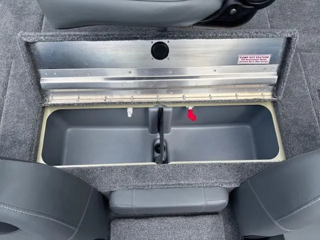 Slide: The Image of 2025 Tracker Pro Team 175 boat storage compartment with gray interior and seating. - 20