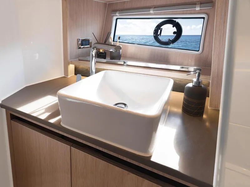 Slide: The Image of Modern bathroom sink in 2024 Sealine C335V yacht with ocean view. - 18