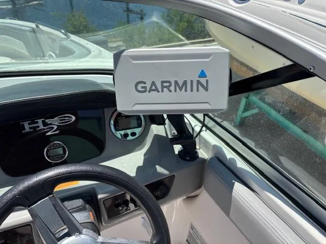 Slide: The Image of 2019 Chaparral 210 Deluxe boat dashboard with Garmin GPS system. - 17