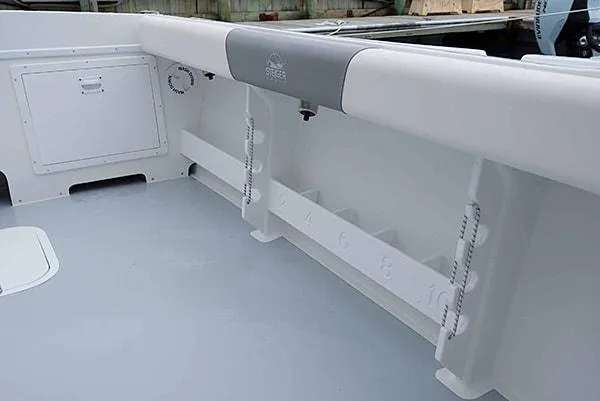 Slide: The Image of 2026 Steiger Craft 23 Miami boat interior with rod holders and storage compartments. - 18