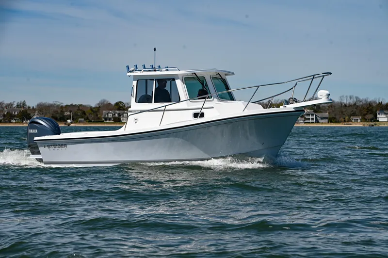 Slide: The Image of 2026 Steiger Craft 23 Miami boat cruising on water, side view. - 5