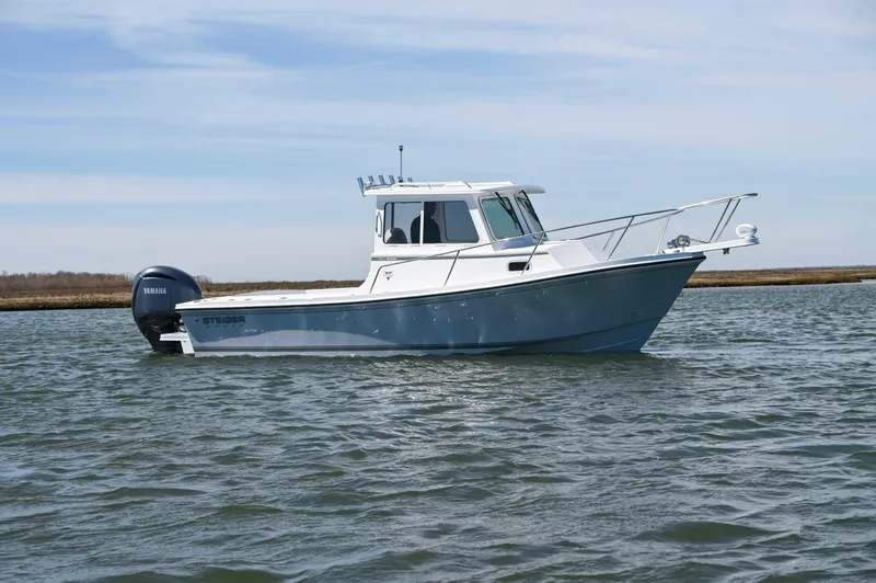 Slide: The Image of 2026 Steiger Craft 23 Miami boat on water with Yamaha engine. - 7