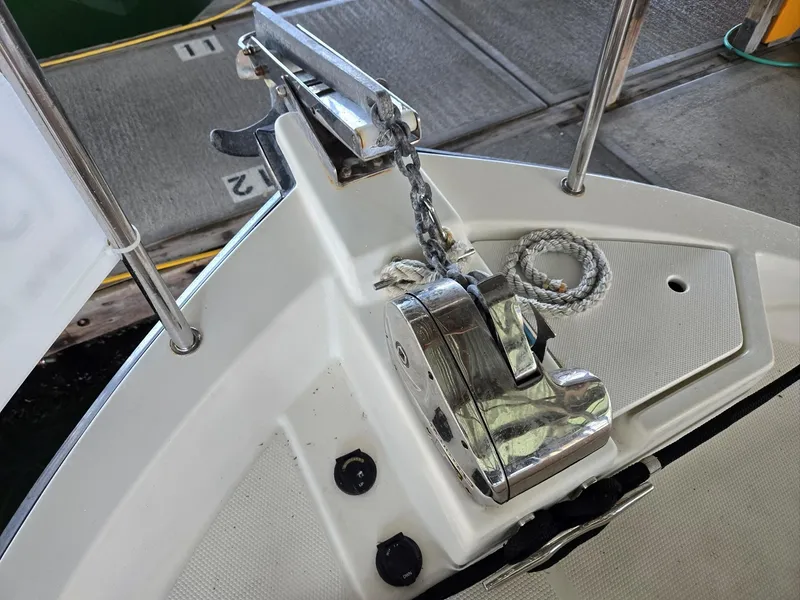 Slide: The Image of Anchor system on 2014 Ranger Tugs R-27 boat, docked at marina. - 11