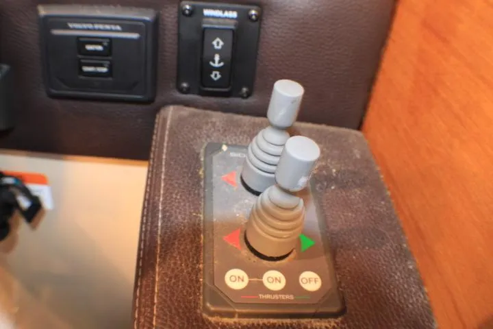 Slide: The Image of Control panel with joysticks on a 2014 Ranger Tugs R-27 boat. - 30