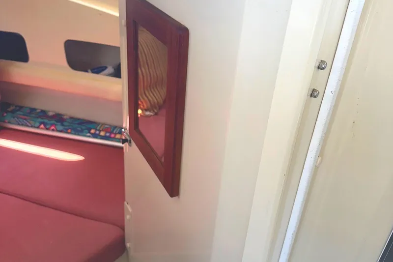 Slide: The Image of Power connection on a 2000 Rosborough 246LVS boat with SmartPlug and padlock. - 16