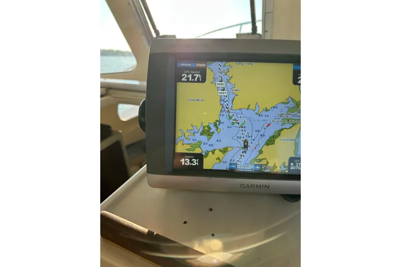 Slide: The Image of A 2000 Rosborough 246LVS boat on calm ocean waters under a clear sky. - 39