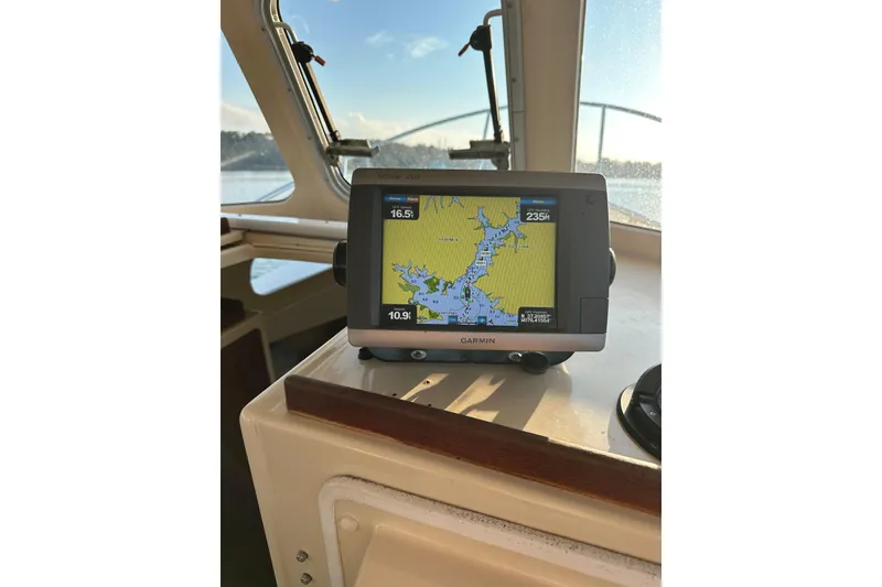 Slide: The Image of Garmin GPS on 2000 Rosborough 246LVS boat, displaying nautical map. - 42