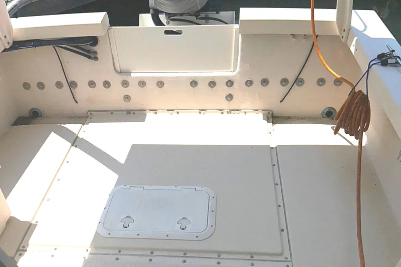 Slide: The Image of Aerial view of 2000 Rosborough 246LVS boat cruising on open water. - 6