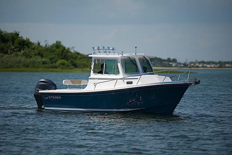 The Image of 2026 Steiger Craft 21 MIAMI boat cruising on calm water. - 0