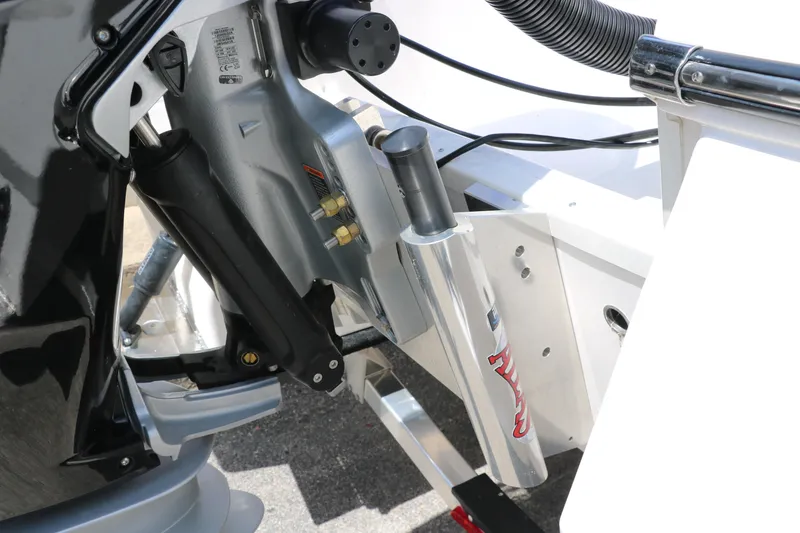 Slide: The Image of 2025 Robalo 246 Cayman boat engine detail with hydraulic components. - 15