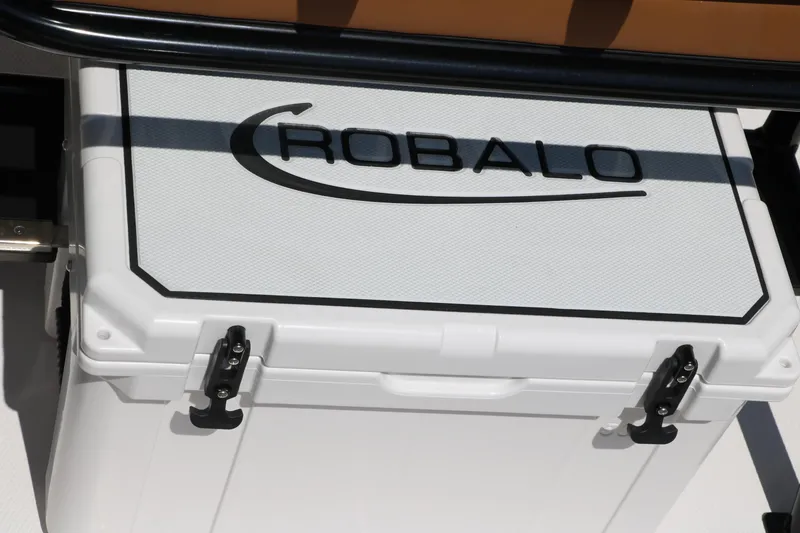 Slide: The Image of Robalo 246 Cayman 2025 boat cooler with logo, featuring secure latches and durable design. - 43