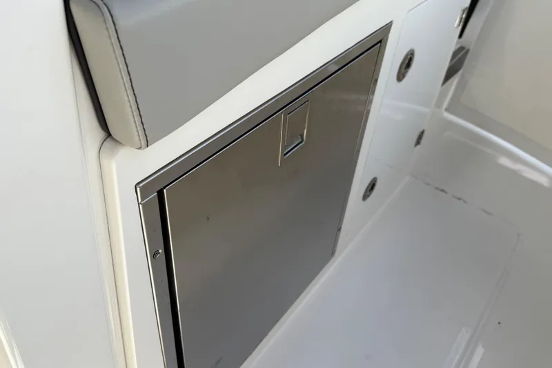 Slide: The Image of 2022 Pursuit S 358 Sport cabin door with secure latch mechanism. - 18