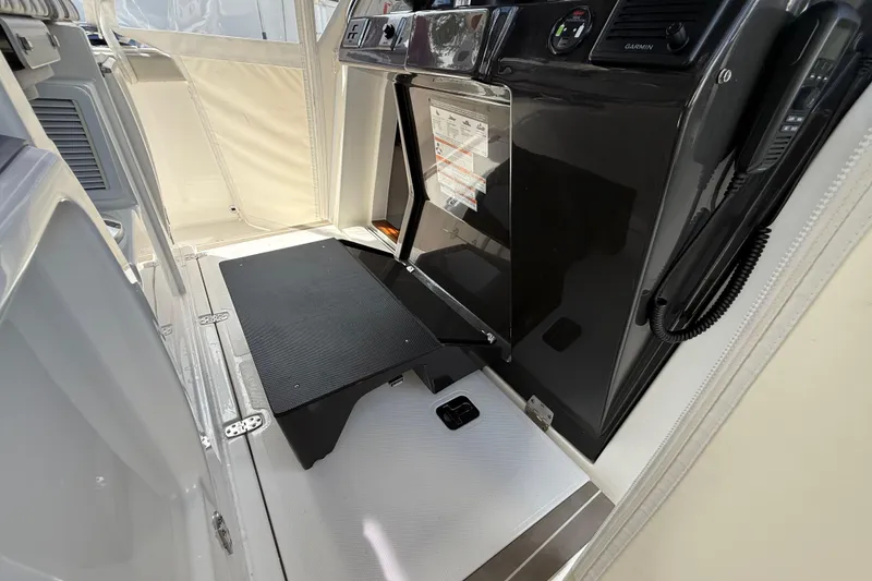 Slide: The Image of 2022 Pursuit S 358 Sport boat interior with sleek design and modern features. - 26