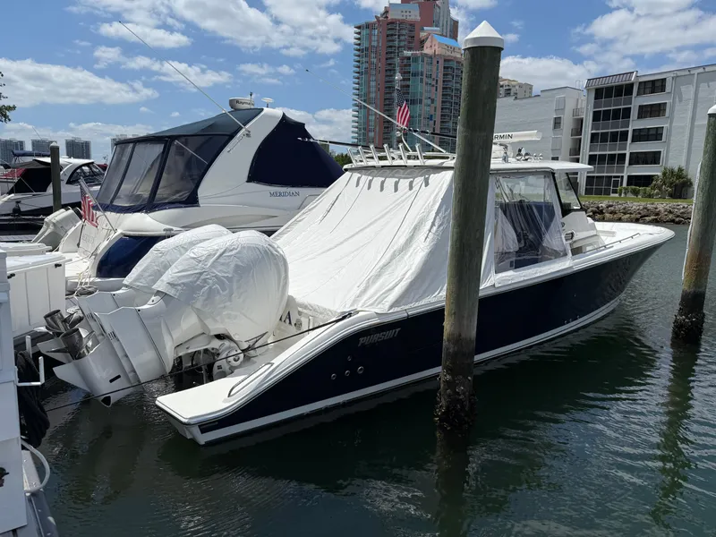 Slide: The Image of 2022 Pursuit S 358 Sport boat with Garmin radar and American flag. - 48