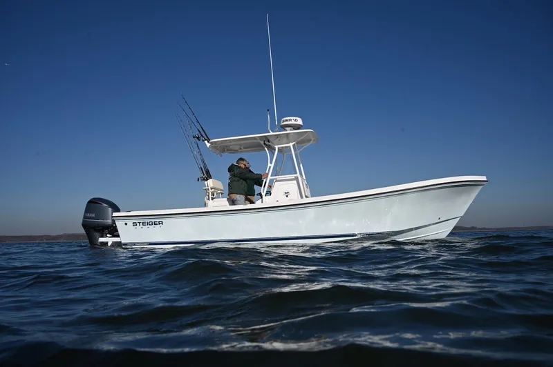 The Image of Steiger Craft 255 Tournament 2026 boat on water, clear sky background. - 0