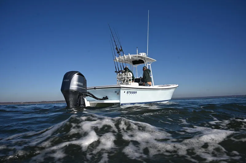 Slide: The Image of Steiger Craft 255 Tournament 2026 boat on open water with Yamaha engine. - 3