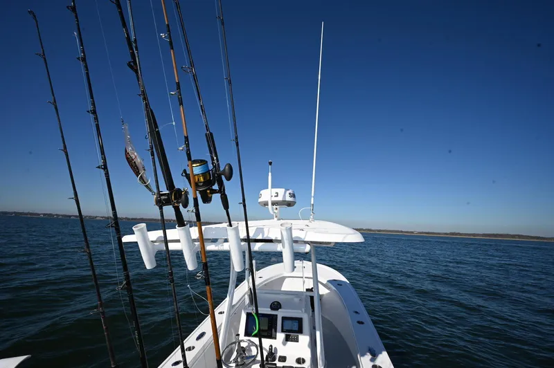Slide: The Image of Steiger Craft 255 Tournament boat with fishing rods on open water, 2026 model. - 6
