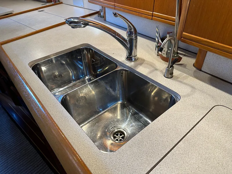 Slide: The Image of Stainless steel sink in Jeanneau Sun Odyssey 45.2 yacht kitchen, 2000 model. - 14