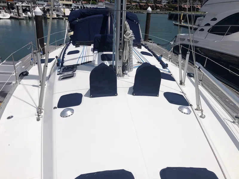 Slide: The Image of Jeanneau Sun Odyssey 45.2 sailboat deck, 2000 model, docked in a marina. - 20