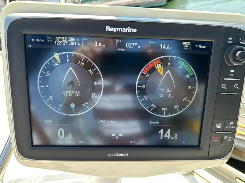 Slide: The Image of Raymarine navigation display on Jeanneau Sun Odyssey 45.2, showing coordinates and depth. - 32