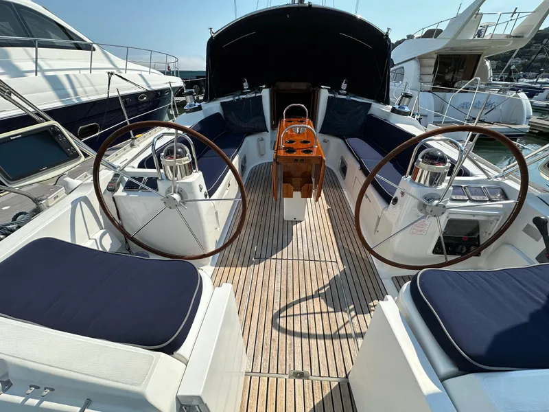 Slide: The Image of Cockpit of 2000 Jeanneau Sun Odyssey 45.2 sailboat with dual steering wheels. - 37