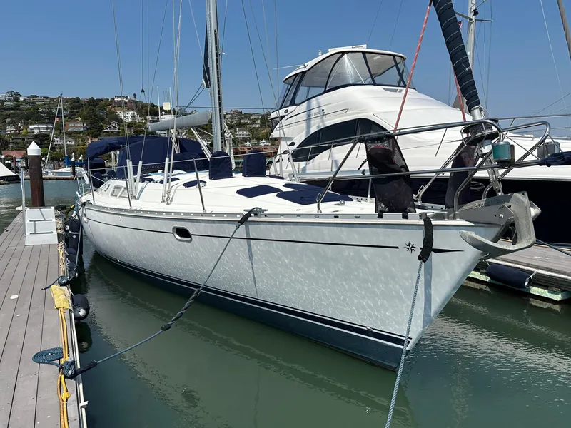 Slide: The Image of Jeanneau Sun Odyssey 45.2 sailboat docked at marina, 2000 model. - 42