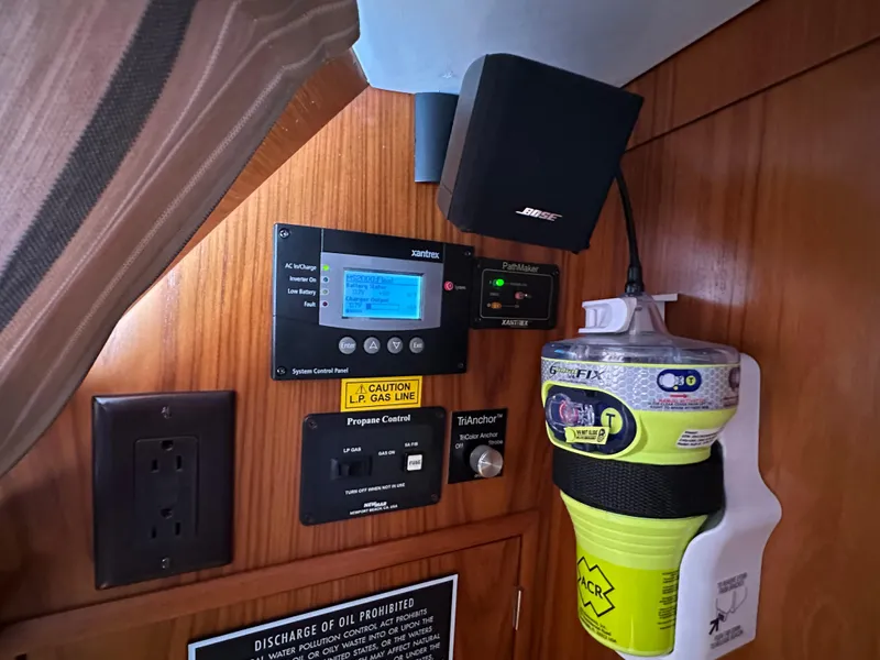Slide: The Image of Control panel and safety equipment on Jeanneau Sun Odyssey 45.2, 2000 model yacht. - 9