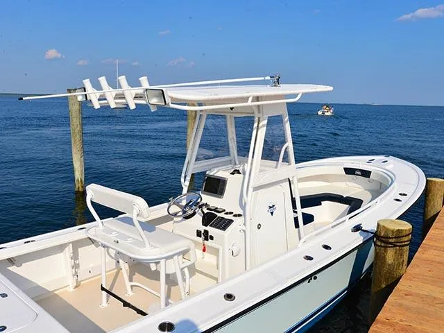 Slide: The Image of 2026 Steiger Craft 23 Tournament boat docked by the ocean on a sunny day. - 6