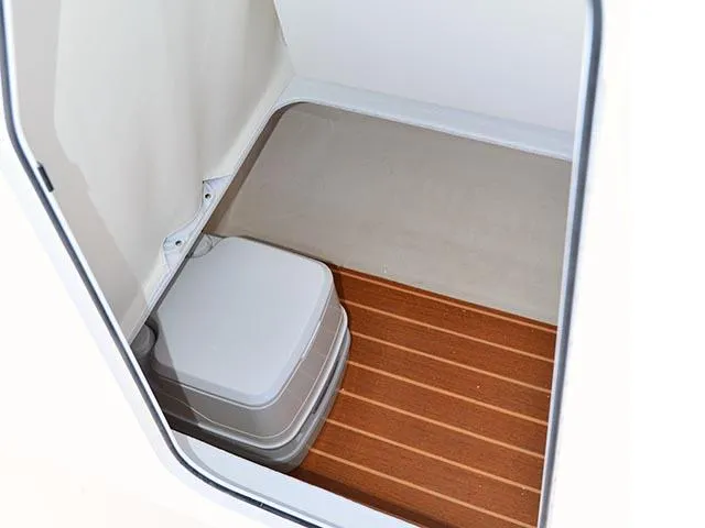 Slide: The Image of Interior of 2026 Steiger Craft 21 Tournament boat with compact marine toilet. - 13
