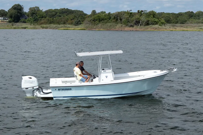 Slide: The Image of 2026 Steiger Craft 21 Tournament boat on water with two people onboard. - 5