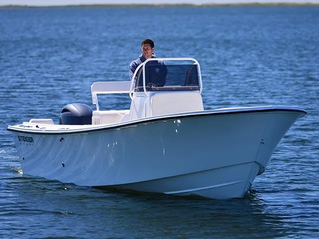 Slide: The Image of 2026 Steiger Craft 21 Tournament boat cruising on open water. - 6