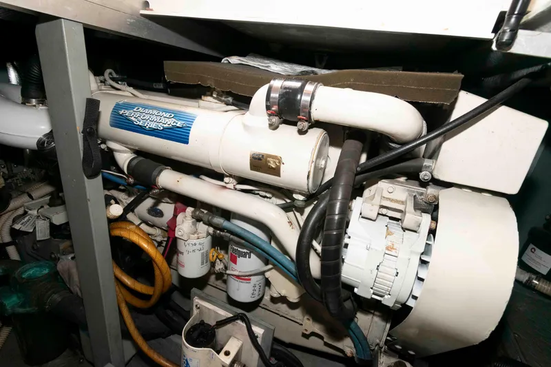 Slide: The Image of Engine room of 2000 Sea Ray 420 Aft Cabin with Diamond Performance Series components. - 23
