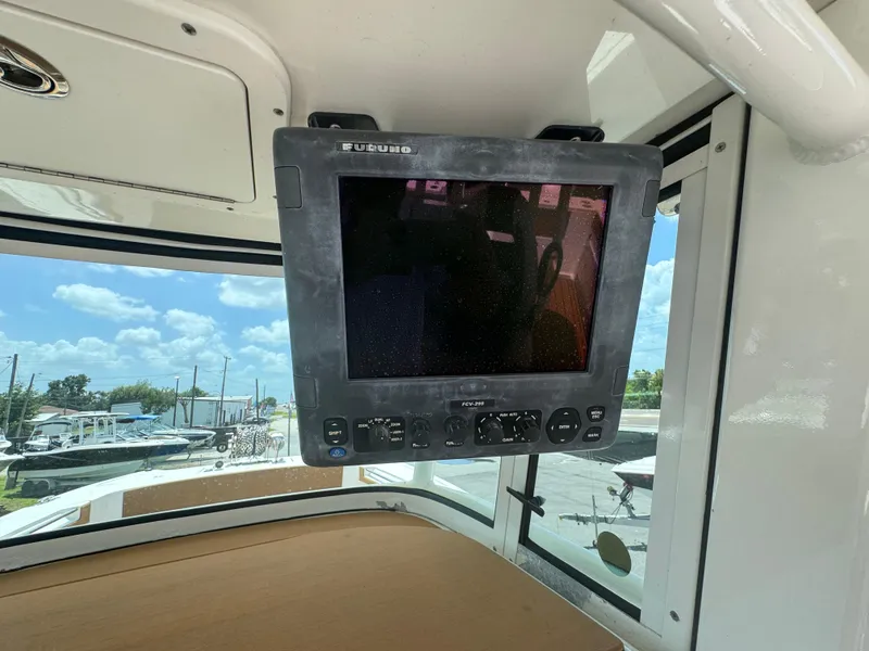 Slide: The Image of Furuno marine display on 2019 World Cat 3200 boat, with outdoor view. - 16