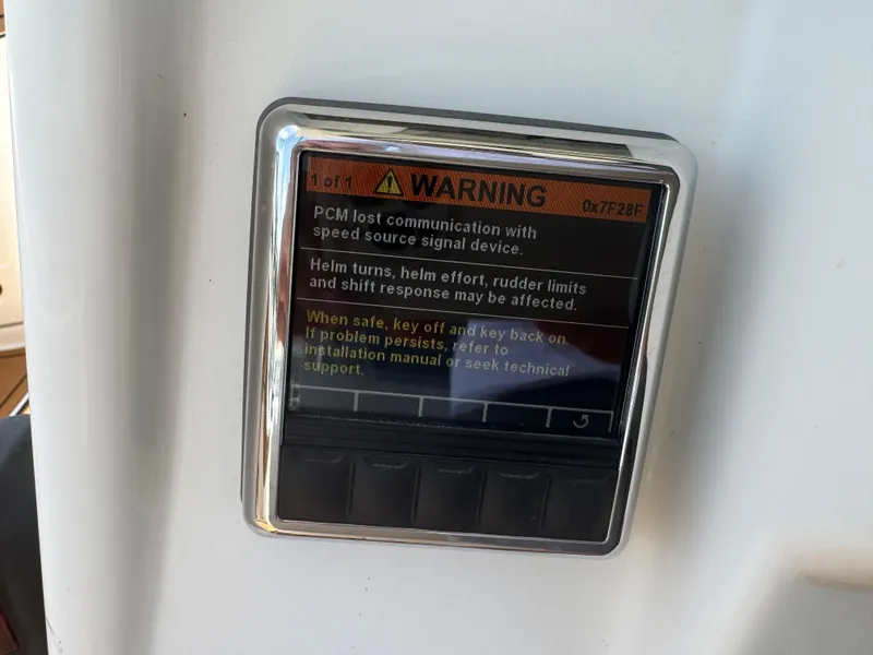 Slide: The Image of Warning display on 2019 World Cat 3200 boat showing PCM communication error. - 19
