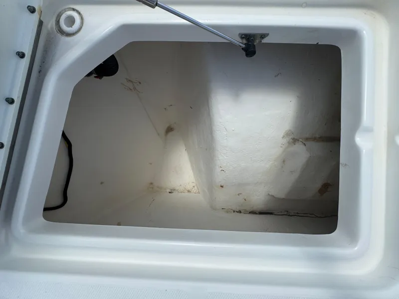 Slide: The Image of Open storage compartment in 2019 World Cat 3200 boat. - 30