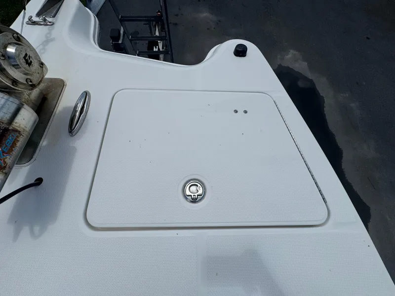 Slide: The Image of 2019 World Cat 3200 boat deck with hatch and winch. - 31