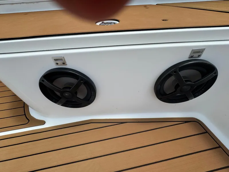 Slide: The Image of 2019 World Cat 3200 boat speakers on teak deck. - 37