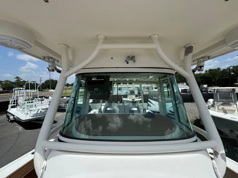 Slide: The Image of 2019 World Cat 3200 boat with a spacious cockpit and modern design. - 41