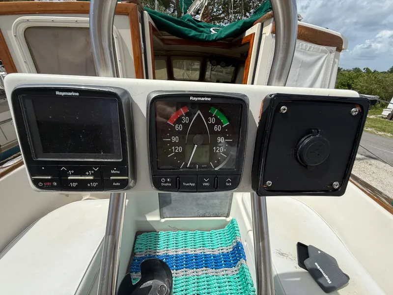 Slide: The Image of Control panel of 1994 Pacific Seacraft Pilothouse 32 with Raymarine instruments. - 14
